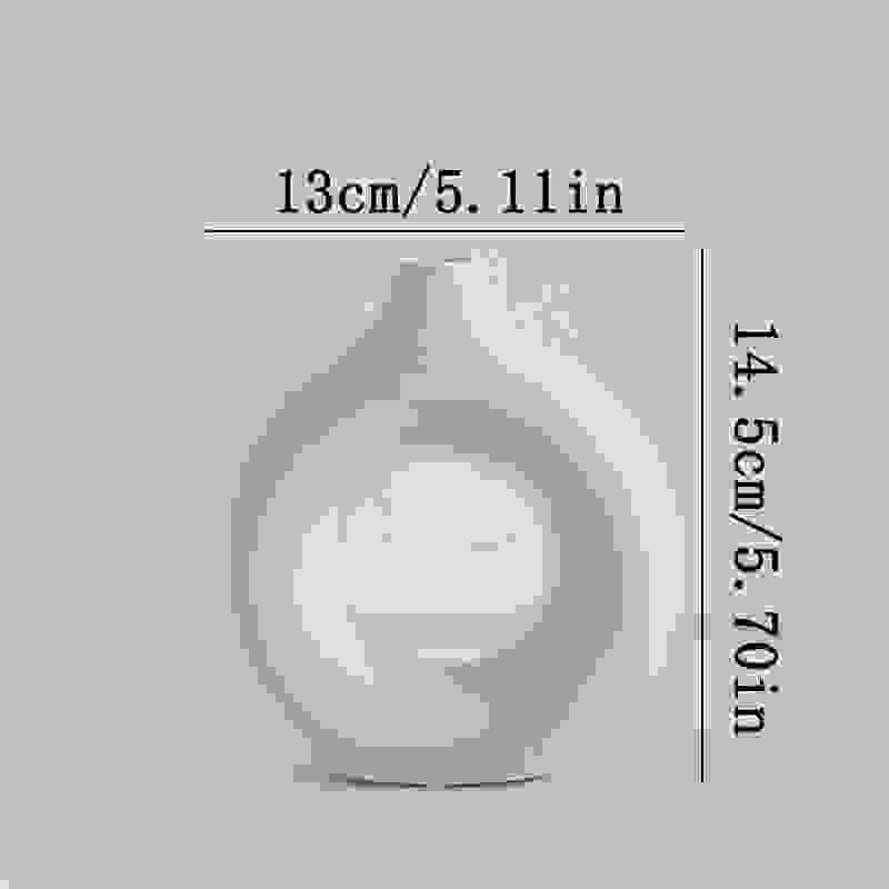 Small white NordicBloom™ Elegant Flower Vase Decorative Display, 14.5cm tall and 13cm wide, ideal for compact decorative spaces.