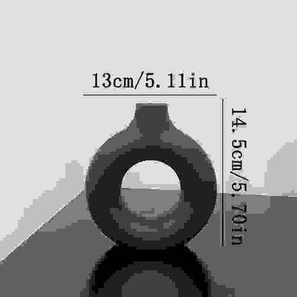 Small black NordicBloom™ Elegant Flower Vase Decorative Display, 14.5cm tall and 13cm wide, ideal for minimalist decor accents.